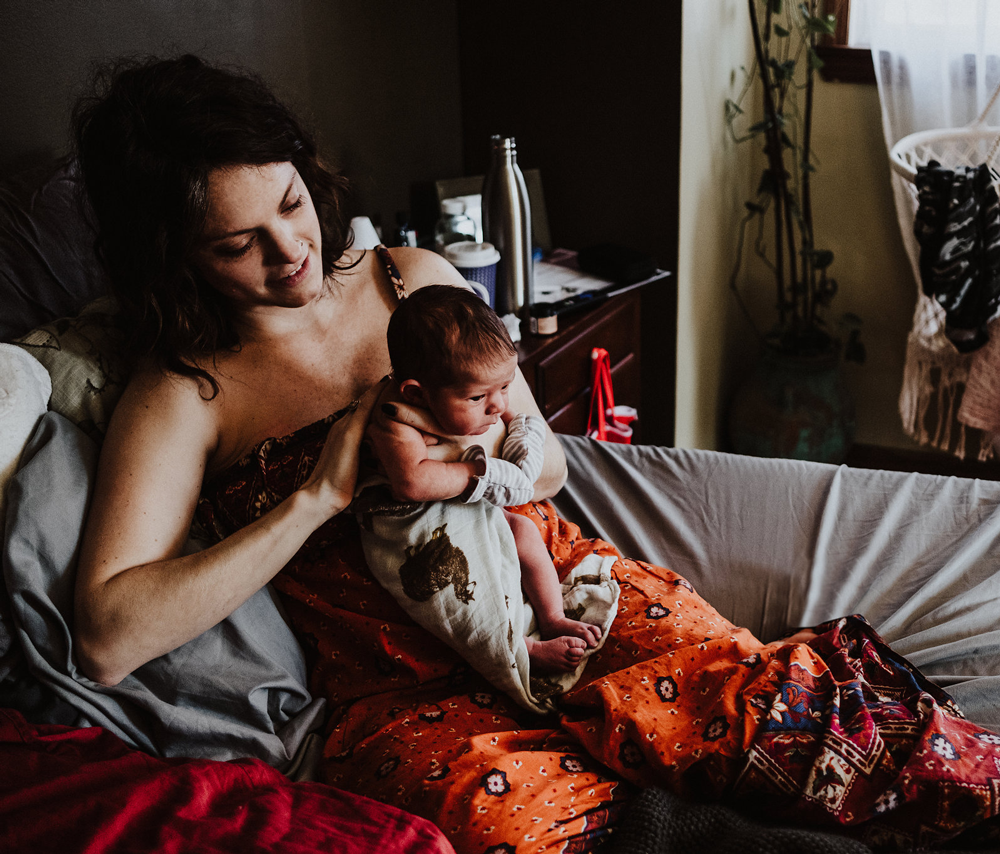 Person holds infant